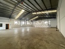 Nave industrial al lado de A7